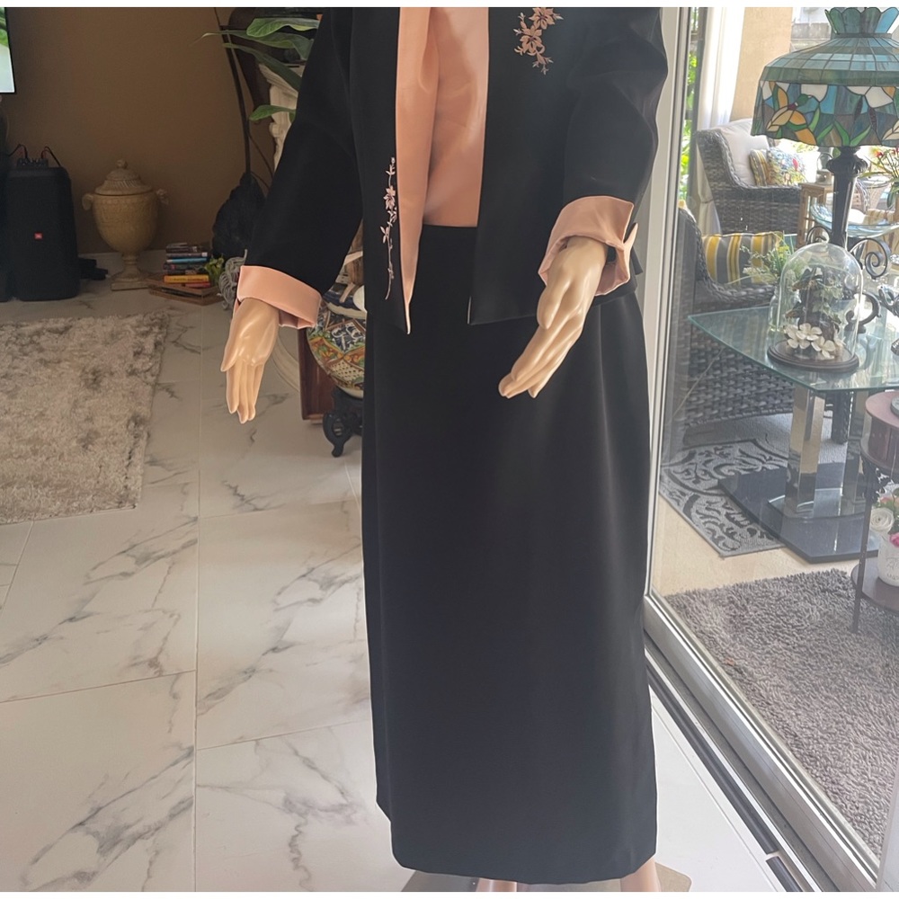 3 PCs set suit black and peach colored flowers design .
